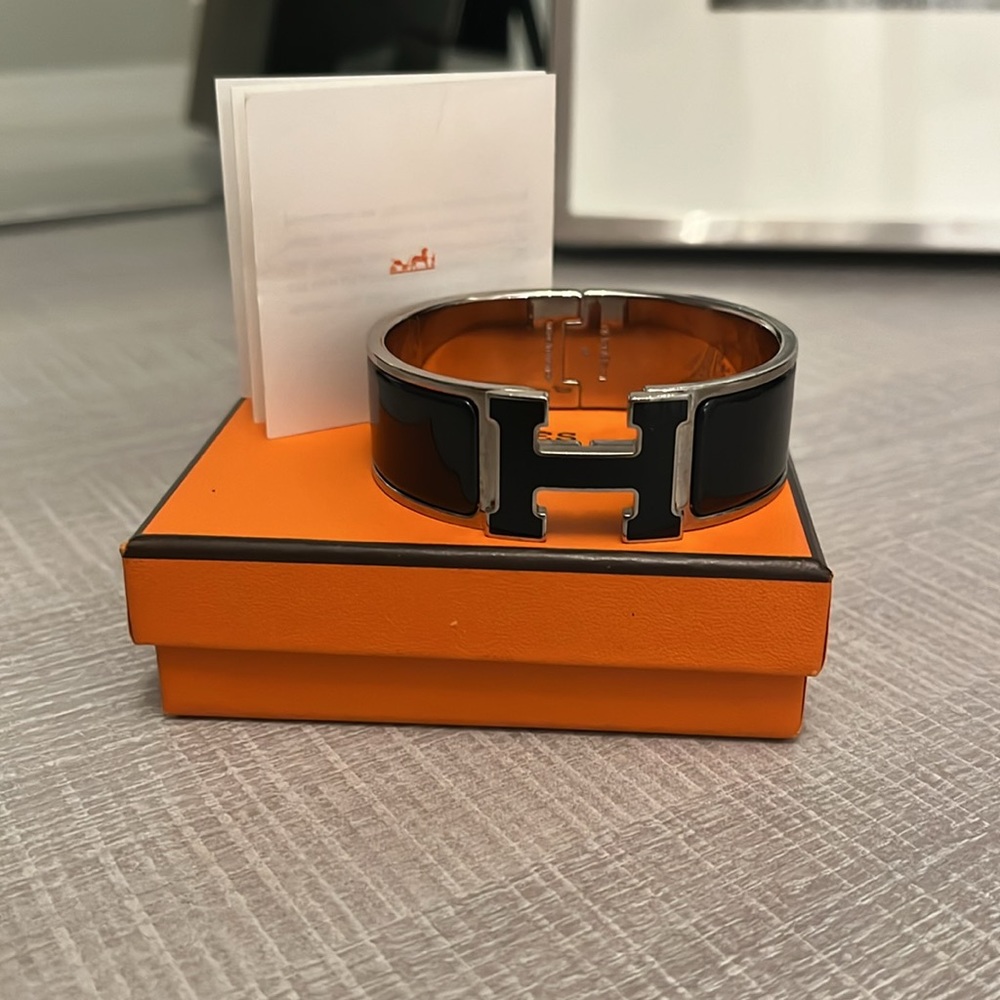 Authentic Hermès PM Wide Bracelet with box and book black and silver.